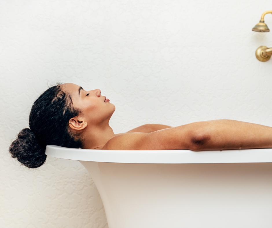 Woman relaxing in warm bath for joint pain relief and improved circulation